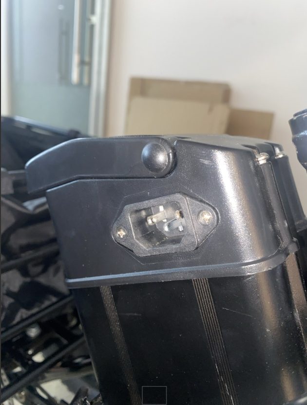 Photo showing the battery indicator button and light check area.